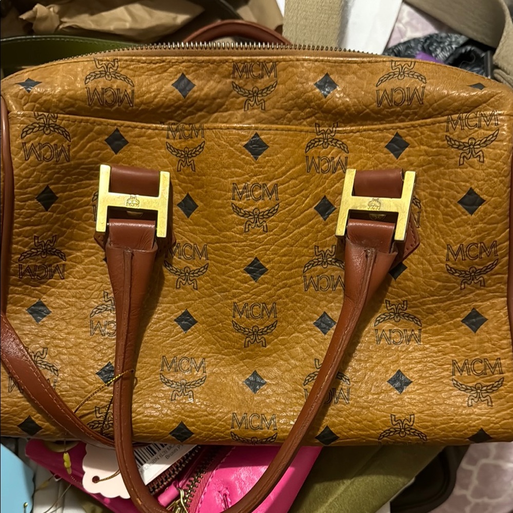 MCM Brown Satchel with Monogram Design and Gold Hardware